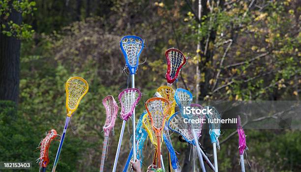 Girls Lacrosse Sticks Raised In The Air Stock Photo - Download Image Now - Lacrosse, Lacrosse Stick, Photography