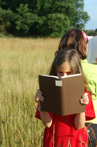 Two girls reading.Books and book lovers lightbox: