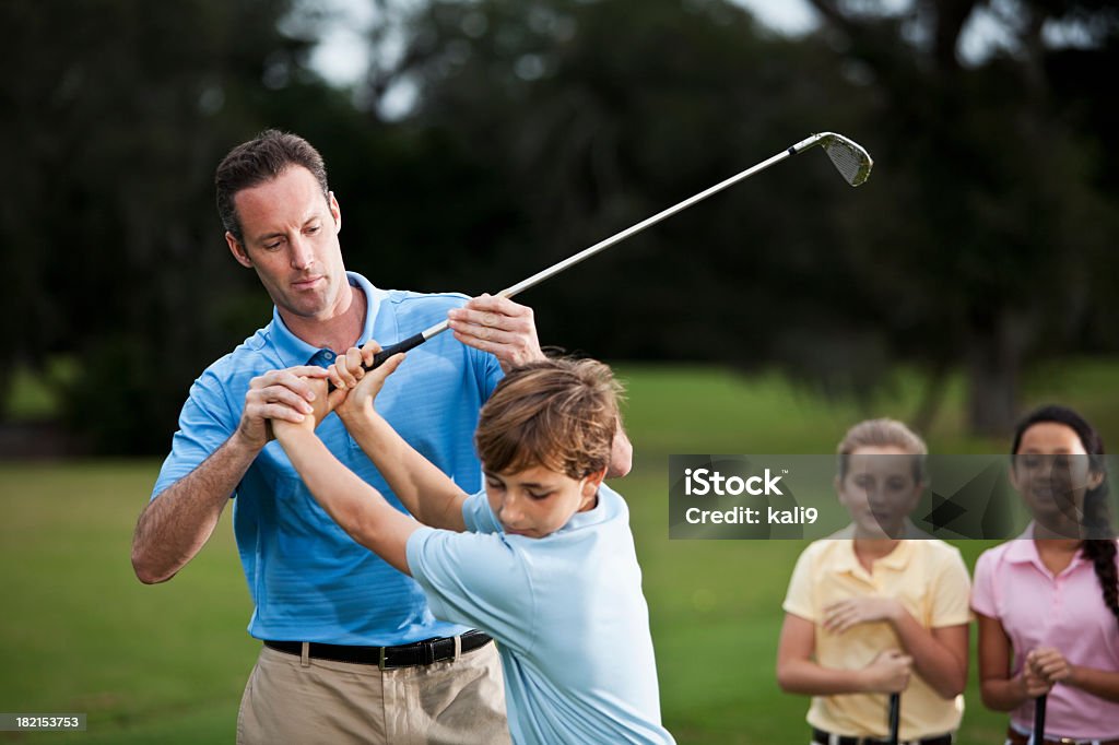 Golf instructor anpassen Jungen Griffigkeit - Lizenzfrei Golf Stock-Foto