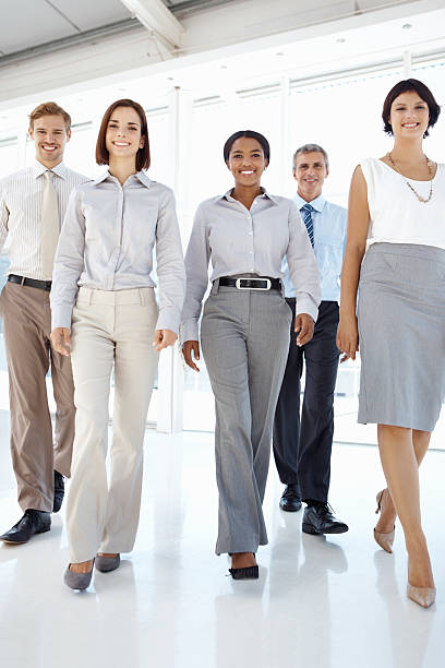 istock Group of business people walking 182153927