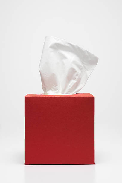 Handkerchief and red tissue box stock photo