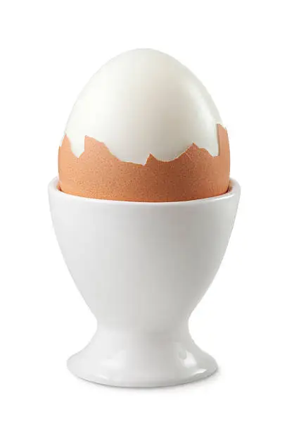 Boiled egg in an white eggcup.Similar photographs from my portfolio: