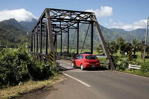 This one lane bridge built in 1912 is still the only way into the historical town of Hanalei. It crosses over the Hanalei River and the Taro fields located in the Wildlife Refuge.