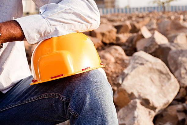 Construction worker tools and hardhat isolated on white background. 3d-rendering