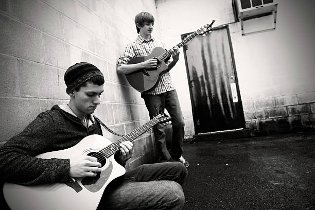 istock Teen Boys Playing Guitar 182155071