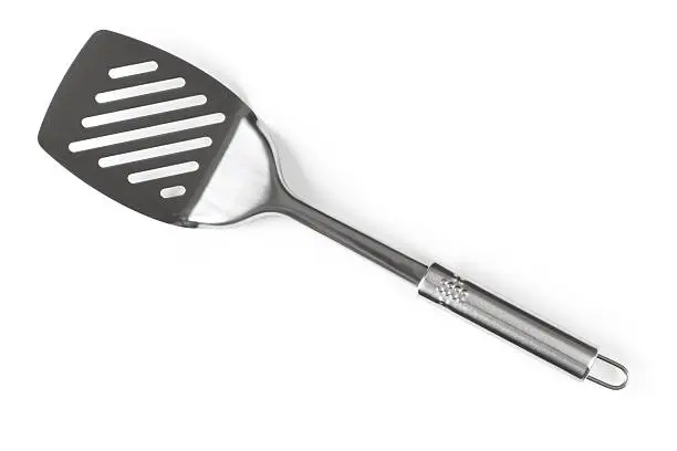 "Stainless steel Spatula on white. This file is cleaned, retouched and contains"