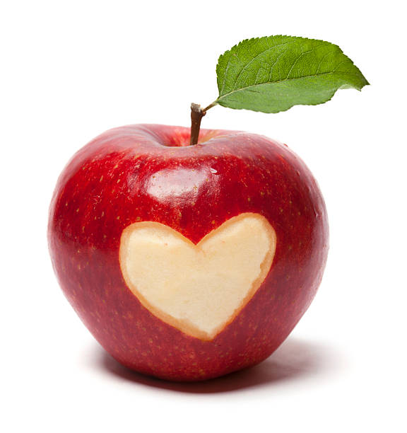 istock Fresh red apple with heart symbol and leaf 182155825