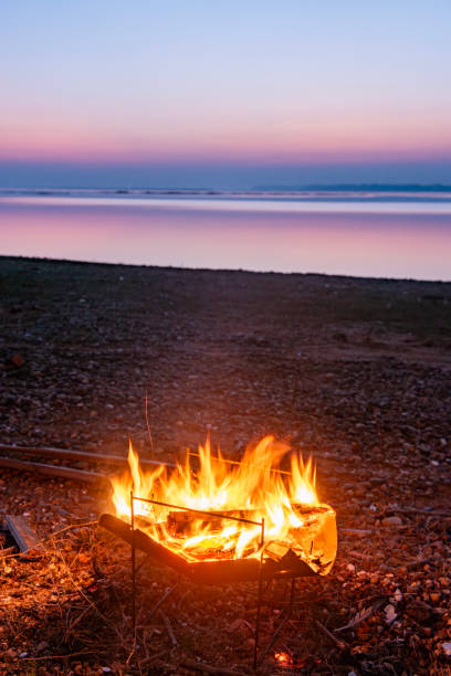 istock Bonfire by the lake in the evening 1821567285