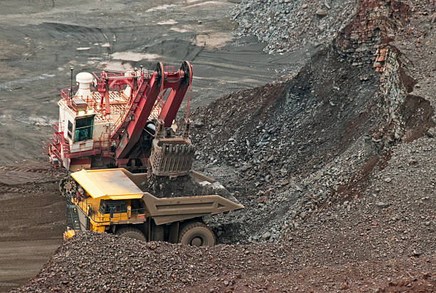 A huge mountain of mining tailings and copper mine with the elevator on top in the Bor Mine in Serbia