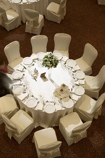 Areal view of the table at the wedding hall dinner party