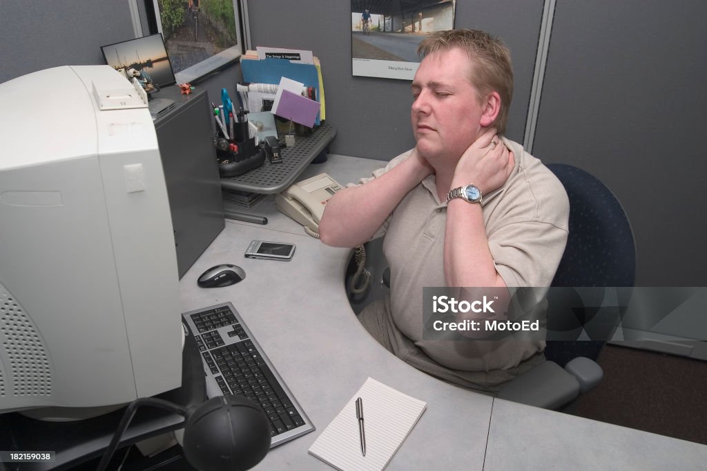 Cou douleur au travail - Photo de Affluence libre de droits