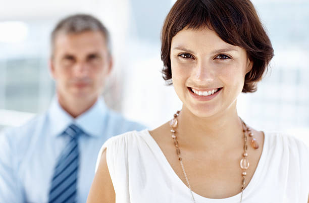 istock Beautiful business woman smiling 182159070