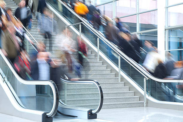 istock People on Stairs and Escalators, Blurred Motion 182160052
