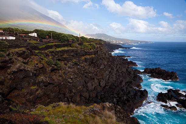 Rainbow on the coastline of PIco island, Azores, Portugal