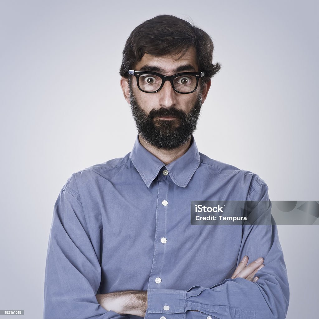 Medio invecchiato uomo con pesanti occhiali con la montatura. - Foto stock royalty-free di Barba - Peluria del viso