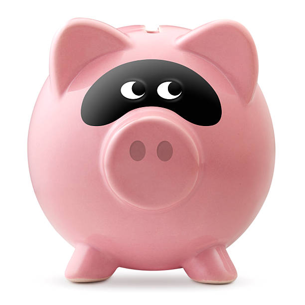 atividade criminosa. piggy bank com uma máscara bandit - perdita - fotografias e filmes do acervo