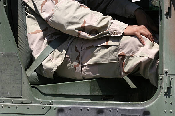 istock Man in Army Car 182161269