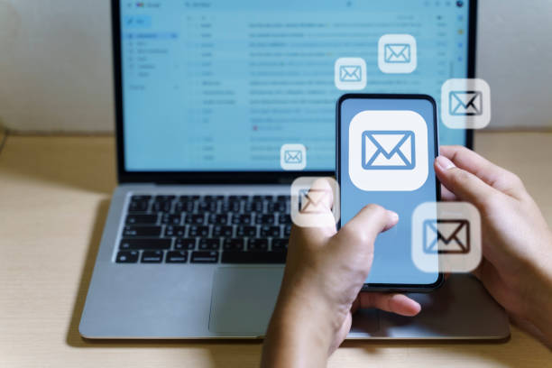 istock Email marketing concept. Hand of businessman using smartphone , tablet, for email virtual screen. Business digital technology and marketing. 1821613130