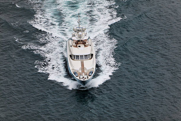 istock Above view motor yacht in motion 182161916