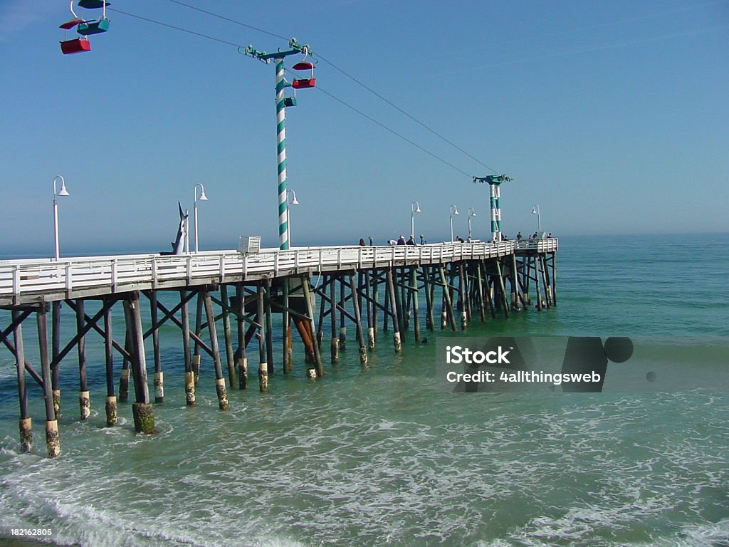 Fishing Pier on the Ocean "Daytona Beach, Florida fishing pier." Beach Stock Photo