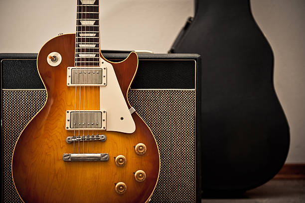 Vintage Electric Guitar with amplifier and bag  amplifier photos stock pictures, royalty-free photos & images