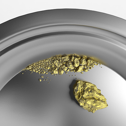 Gold nuggets in a gold panning pan. Very high resolution 3D render.