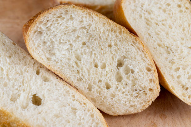 istock wheat loaf of bread close-up on the table 1821643173
