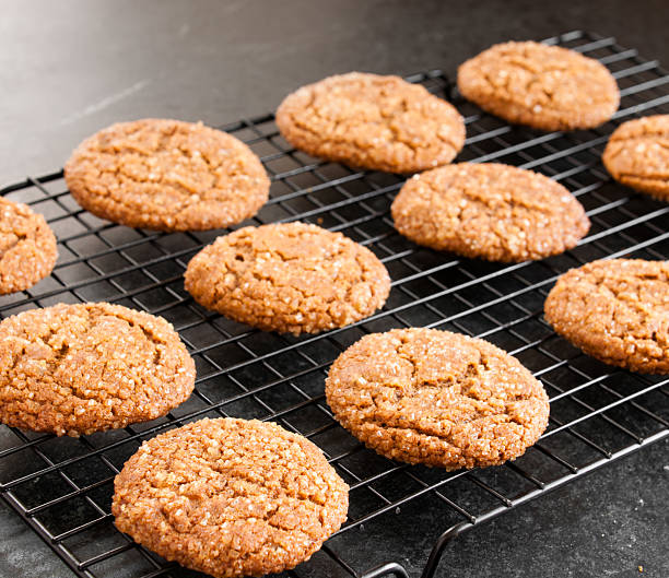 Freshly Baked Ginger Snaps Cooling on Rack stock photo