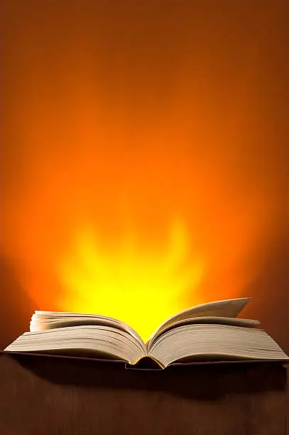 "Open book with fiery lighting behind it.To see the rest of my Religion Book Series, please click"