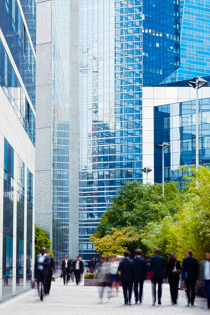 istock Business people walking in a financial district, blurred motion 182164882