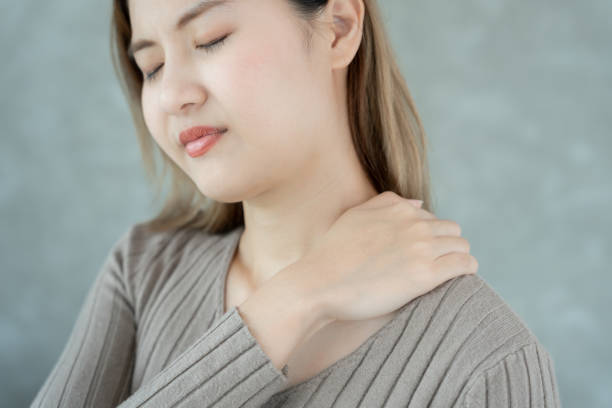 istock office syndromes, woman massaging neck pain due to work and using a computer, digital composite of a focused spine of neck pain and shoulder pain symptoms , injuries, health care, medical, myositis 1821661287