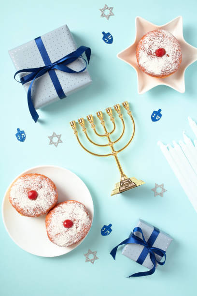 istock Traditional Hanukkah celebrations elements on blue background. Flat lay, top view. 1821667622