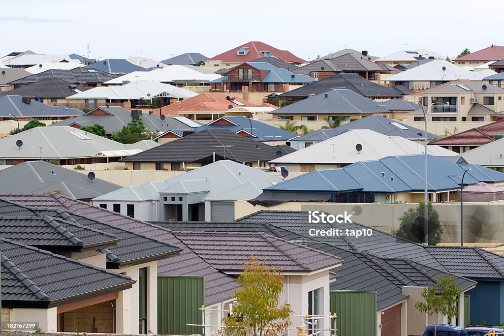 Suburban Scene Residential houses in a Rockingham Suburb - Western Australia. Typical of modern life this new development shows suburban sprawl as a landscape of roof tops.  Australia Stock Photo