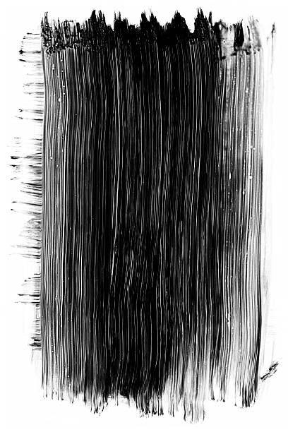 Grunge black paint brush stroke isolated on white