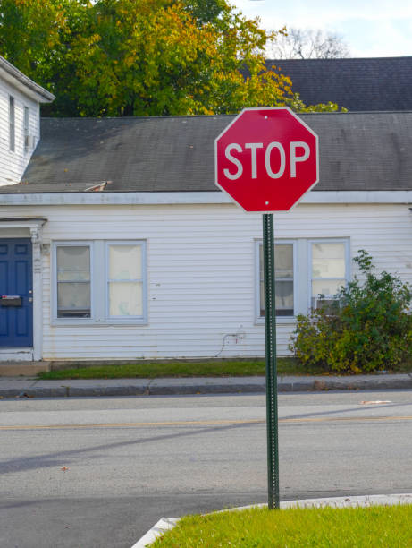 istock residential street with stop sign 1821680666
