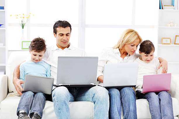 istock Family with laptops. 182168658