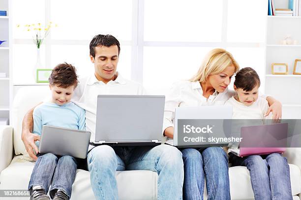 Family With Laptops Stock Photo - Download Image Now - Laptop, Togetherness, Video Game