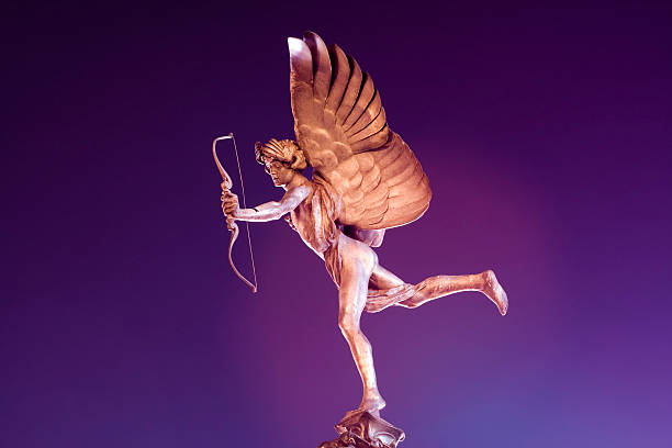 cupido - sculpture statue cupid gold foto e immagini stock