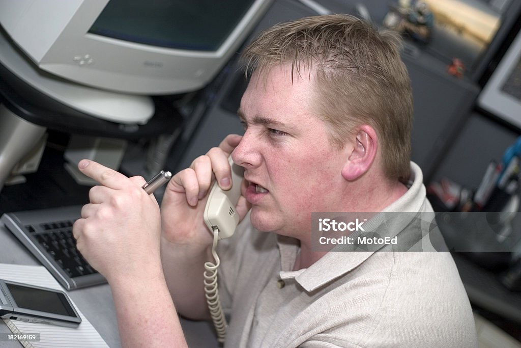 사무실 전화 겪는 사람들의 짜증 - 로열티 프리 가리키기 스톡 사진