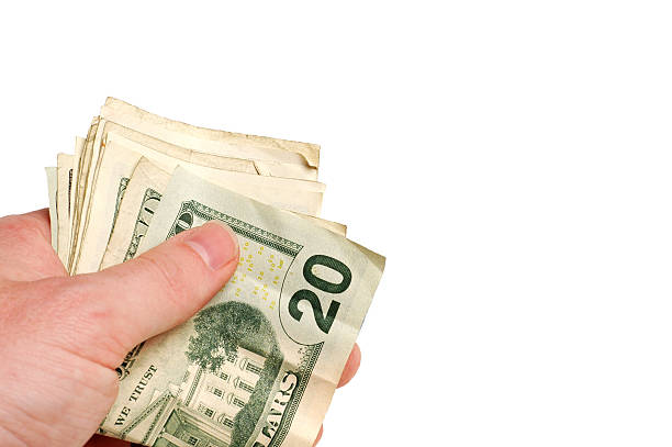 istock Human Hand Holding US Dollars Money 182169227