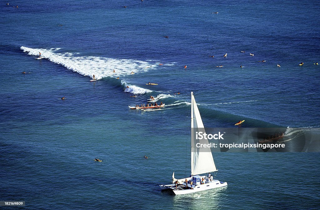 USA Hawaii O'ahu, Waikiki. "USA Hawaii O'ahu, Waikiki, with surfing, canoes, and catamarans." Surfing Stock Photo