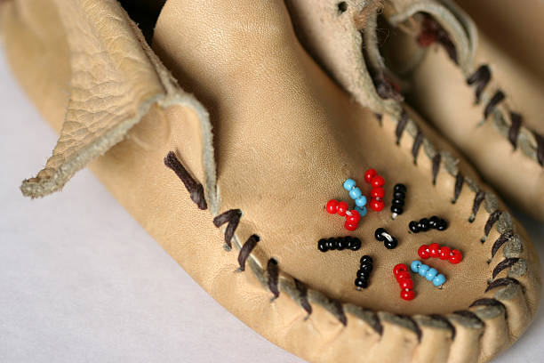 beaded leather moccasins stock photo