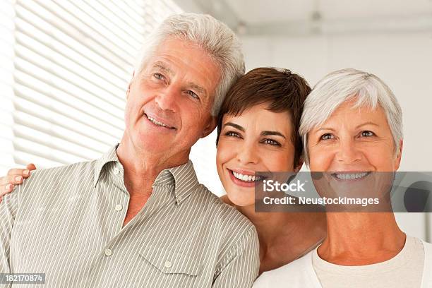 Happy Family With Arm Around Stock Photo - Download Image Now - 60-69 Years, 65-69 Years, 70-79 Years