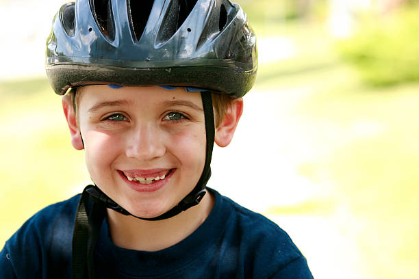 istock Boy Riding a Bicycle with Helmet 182171378