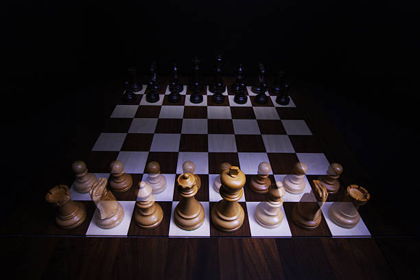 Chess Board with ghost army stock photo