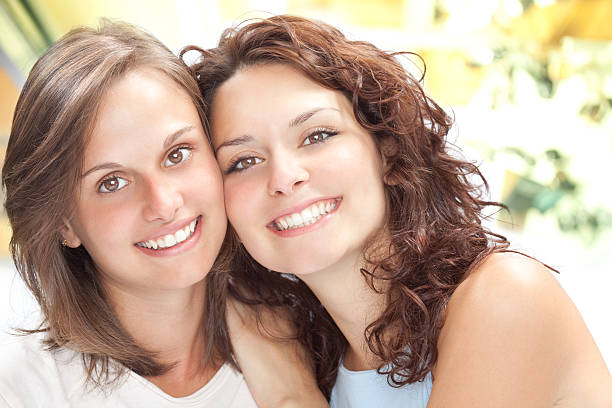 istock two beautiful young friend girl happiness 182171689