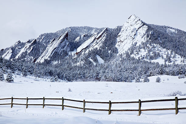 Spring Snow on Flatirons Snow on the Boulder Flatirons. rail fence stock pictures, royalty-free photos & images