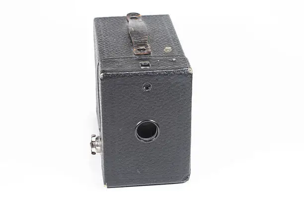 Early 20th century box camera isolated on white background