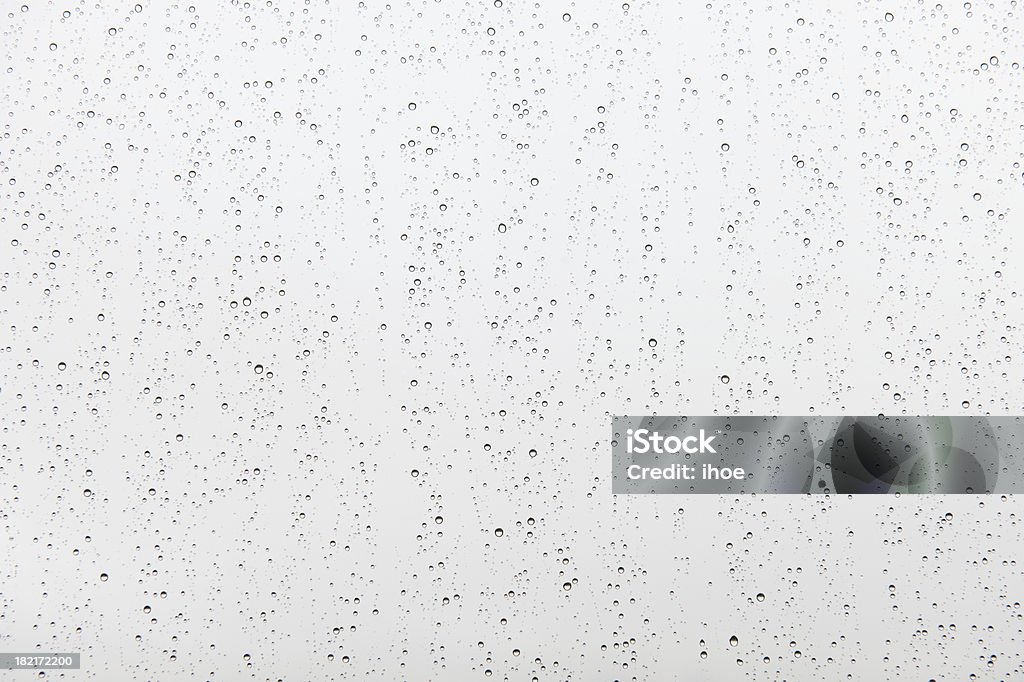 Rain Drops on Glass Rain Drops on Window pane Rain Stock Photo