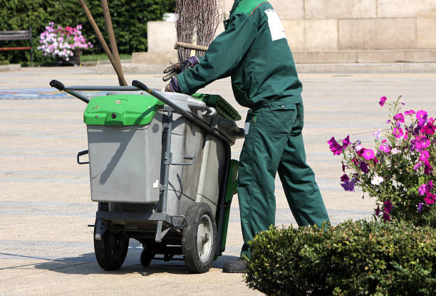 street sweeper is working street sweeper is working street sweeper stock pictures, royalty-free photos & images